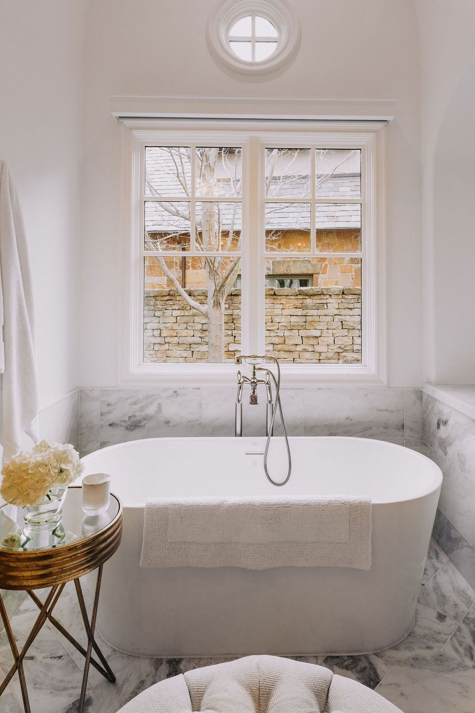 Marble primary bathroom remodel with freestanding tub in Tarrant County, Texas